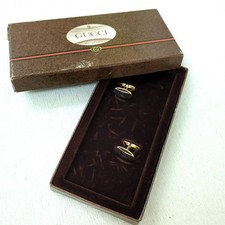 Gemelli Gucci logo GG oro