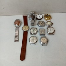 Lotto 12 orologi meccanici vintage manuali tutti per ricambi o riparazioni