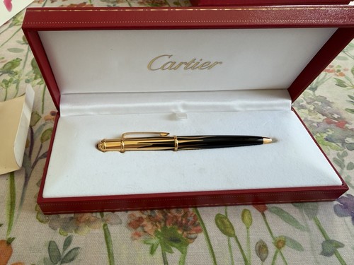 Cartier flame logo - cartier,