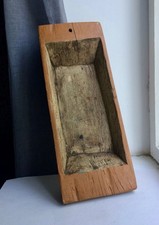 Trogolo di legno intagliato a