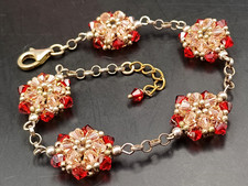 BRACCIALE CON CRISTALLI SWAROVSKI - FIORI BICOLORE CON CATENA