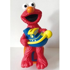 Muppets - ELMO SALVADANAIO con BARCA - Pupazzo in GOMMA PVC  h 17 cm JIM HENSON