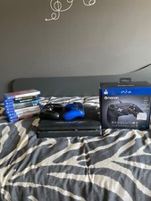 ps4 slim+9 giochi + 2 joypad+ joypad gamer