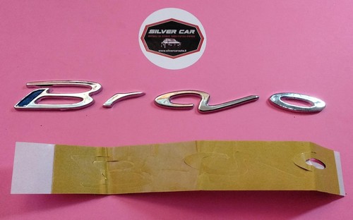 Scritta posteriore argento - , e