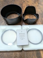Nikon HB-77 HB-N106 paraluce + filtri UV 55mm e 58mm + batteria EN-EL14a usata