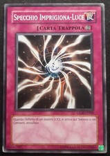 SPECCHIO IMPRIGIONA LUCE in