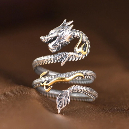 Anello drago fiamma intagliato