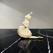 Statuina ballerina seduta RG