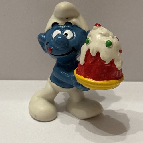 Puffo con torta - con,