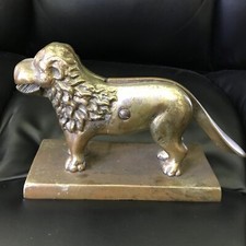 Dado leone in ottone pesante -