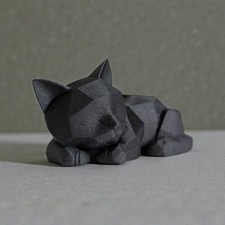 Statua di un gatto dormiente