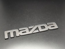 MAZDA 140MM LOGO SIGLA EMBLEMA FREGIO STEMMA SCRITTA BADGE TARGA NOME GD2751781
