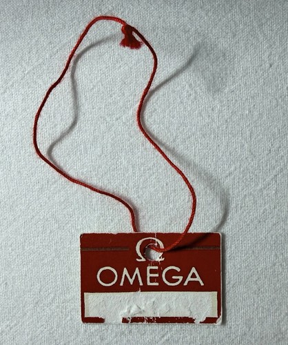 Omega hang tag - hang, cartellino