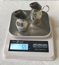 due oggetti vintage in peltro