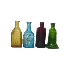 Set 4 bottiglie in rilievo