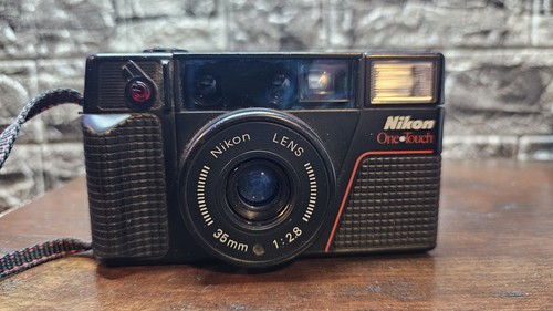 Nikon one touch - nikon,