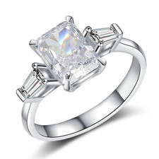 Anello a tre pietre con