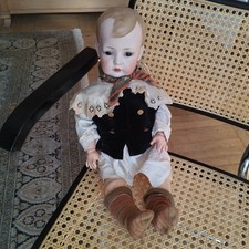 Antica bambola in porcellana