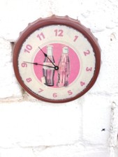 Orologio pubblicitario Coca Cola a forma di tappo da collezione