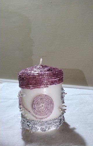 Candela decorata con - candela,