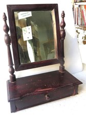 11 Una graziosa psiche (specchio d’appoggio)dell'800  in legno tinto mogano