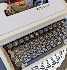 Vtg Olivetti DORA Spanish made Portable Typewriter With Case Working Condition