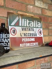 Insegna Alitalia arrugginita