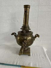 Antico bollitore tè a carbone