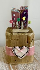 Case in legno alla deriva