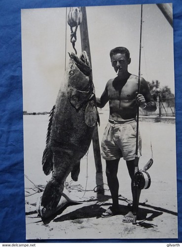 Pécheur gros mer - pécheur, au
