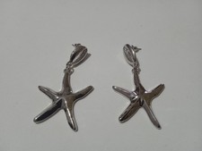Orecchini colore argento modello stella marina e conchiglia donna