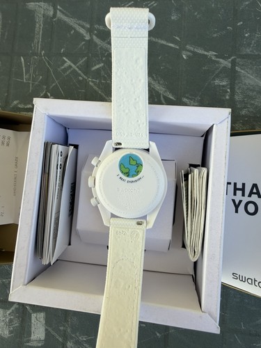Swatch omega mission - swatch,