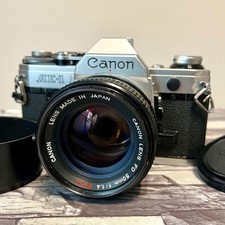 Canon AE-1 fotocamera reflex pellicola 35 mm con obiettivo Canon FD 50 mm F1.4 s.s.c.! Dal Giappone