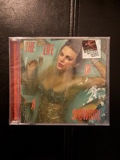 TAYLOR SWIFT La vita di una showgirl cd + foto firmata a mano 2 PREVENDITA