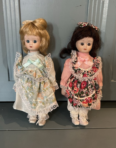 Pair porcelain dolls - pair,
