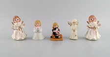 Cinque figurine di porcellana
