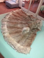 pelliccia castoro lunga sfiancata ampia ruota collo sciallato tasso polsi bordi 