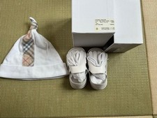 Set cappello e prime scarpe