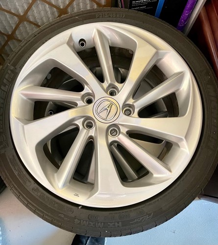Silver acura rims - 17", low