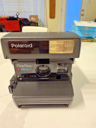 Polaroid one step close - step,