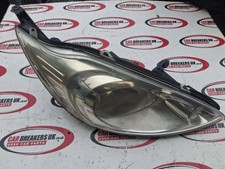 Faro proiettore anteriore lato