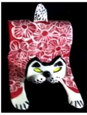 Scultura di ceramica porta