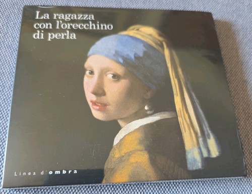 Ragazza con orecchino di - l'orecchino,