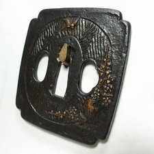 Manicotto intarsiato stile