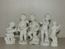 Gruppo di 5 antichi cherubini biscotti in porcellana,1900ca Italia