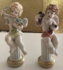 Coppia di antiche statuine