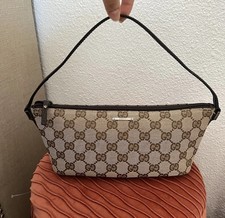 Pochette da barca in tela con monogramma Gucci GG. Borsa a tracolla Gucci. Tela Gucci 