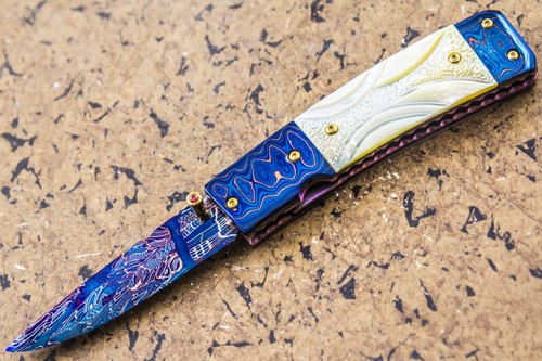 Coltello pieghevole - dc,