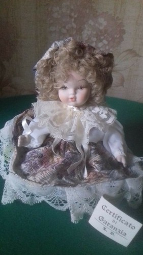 Bambola porcellana - in,