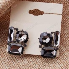 GRANDI ORECCHINI A CLIP GRIGI